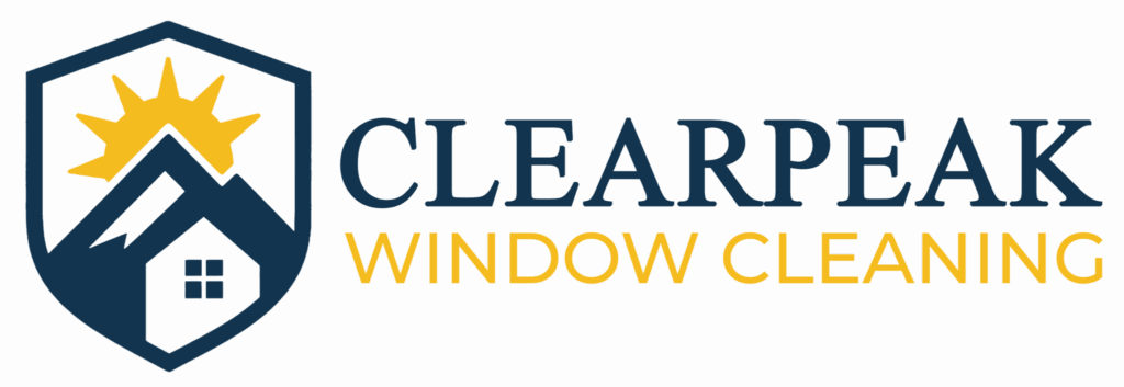 Logo for ClearPeak Window Cleaning featuring a shield with a sun, mountains, and house, alongside the business name in blue and yellow text&mdash;perfect for boosting your brand&rsquo;s google optimization.